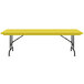 A yellow rectangular Correll folding table with black legs.