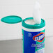 A container of Clorox disinfectant wipes with a lid.
