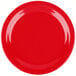 A red Carlisle Dallas Ware melamine plate with a white background.