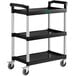 A black utility cart with three shelves and silver legs and wheels.