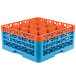 A white plastic Carlisle glass rack with orange and blue accents.