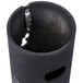 A black Aarco wall mounted cylinder with a hole in it.