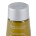 A close up of a Basic Earth Botanicals conditioning shampoo bottle with a yellow label.