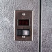 A metal panel with a digital temperature display for a Norlake Kold Locker.