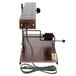 A brown Bron Coucke 1/2 round cheese raclette machine with a black cord.