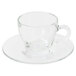 A Libbey clear glass cappuccino cup and saucer on a white background.