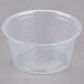 A clear plastic Dart souffle container.