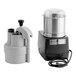 A Robot Coupe commercial food processor with a stainless steel bowl and 4 discs.