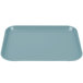 A blue rectangular Cambro Camlite tray with a small handle.