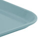 A close-up of a blue Cambro Camlite tray.