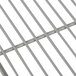 A close-up of a white wire grid shelf.