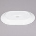 A white rectangular CAC porcelain platter with logo on a gray surface.