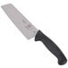 A Mercer Culinary Millennia Nakiri knife with a black handle.