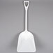A white plastic Carlisle Sparta food service shovel.