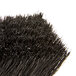 A close-up of a Carlisle black bristle brush head.