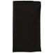 A folded black cloth napkin with white border.