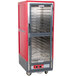 A red and grey Metro C5 heated holding cabinet with clear doors.