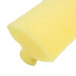 A close-up of a yellow sponge.