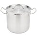 A Vollrath stainless steel stock pot with handles and a cover.