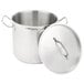 A Vollrath stainless steel stock pot with a lid.