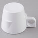 A white Thunder Group Nustone melamine coffee cup with a handle.