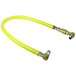 A yellow T&S hose with metal fittings on the ends.