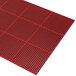 A red Cactus Mat with honeycomb holes.