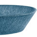 A blue polyethylene oval basket on a table in a salad bar.