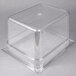 A Carlisle clear polycarbonate food pan with a clear lid.