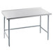 An Advance Tabco stainless steel work table with open base and backsplash on a white table.