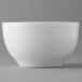 A white Reserve by Libbey porcelain bouillon bowl with a stripe design on a grey surface.