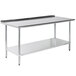 An Advance Tabco stainless steel work table with a backsplash and undershelf.