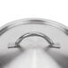 A close-up of a Vollrath stainless steel domed cover with a handle.