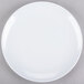 A white GET Siciliano plate with a white rim on a gray surface.