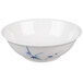 A white bowl with blue bamboo design on it.
