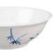 A white Thunder Group melamine bowl with a blue and white bamboo design.