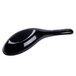 A black spoon with a red handle.