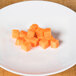 A plate of carrots diced into cubes using a Robot Coupe 5/16" Dicing Kit.