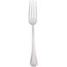 A silver Bon Chef dinner fork with a black handle on a white background.
