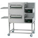 A large stainless steel Lincoln Impinger double conveyor oven.