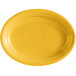 A yellow oval china platter with a white rim.