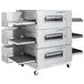 A large metal Lincoln Impinger conveyor oven with three shelves.