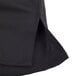 A black Mercer Culinary Millennia air short sleeve cook shirt with a seam.