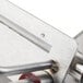 A close-up of a Bron Coucke stainless steel vegetable lasagna slicer.