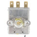 An Avantco thermostat with a yellow wire and a white circle on a gray surface.