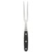 A Mercer Culinary Renaissance forged carving fork with a black handle.