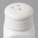 An American Metalcraft white ceramic salt shaker with three holes.