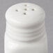 A white American Metalcraft salt shaker with holes.