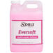 A pink container of Noble Chemical Eversoft liquid laundry softener with a white label.