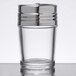 A clear glass American Metalcraft shaker with a stainless steel lid.